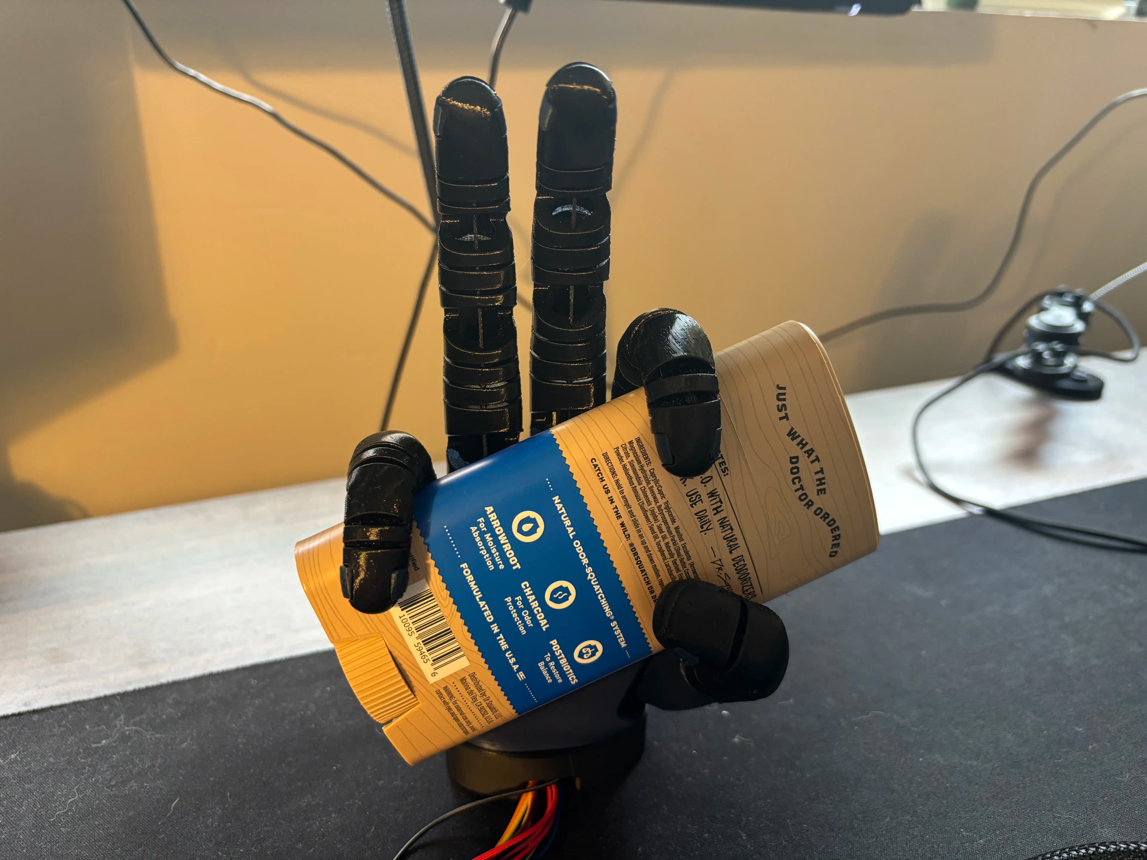 Prosthetic hand grasping a cylindrical object